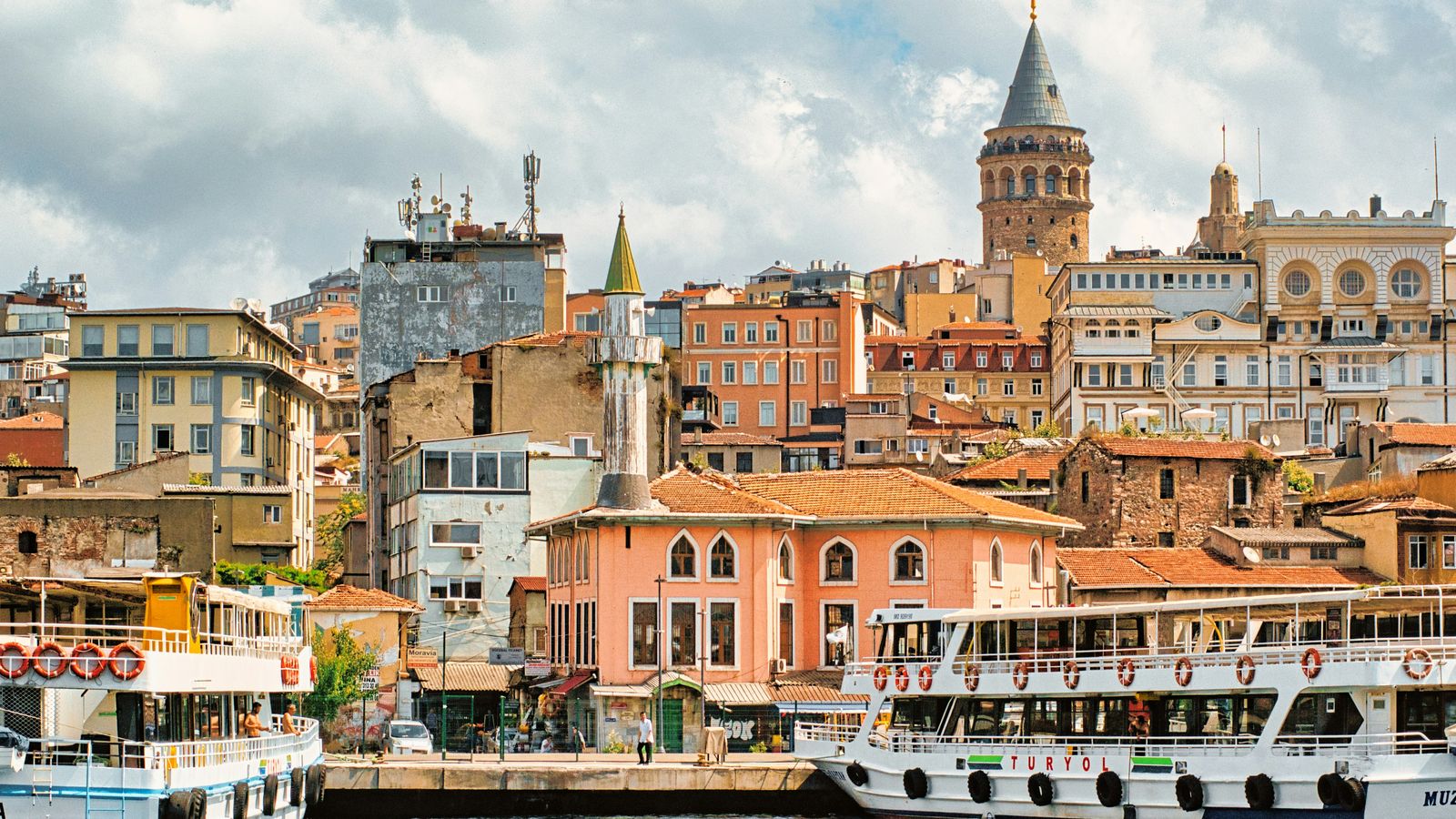 Galata Tower above the Karaköy waterfront in Istanbul, Türkiye